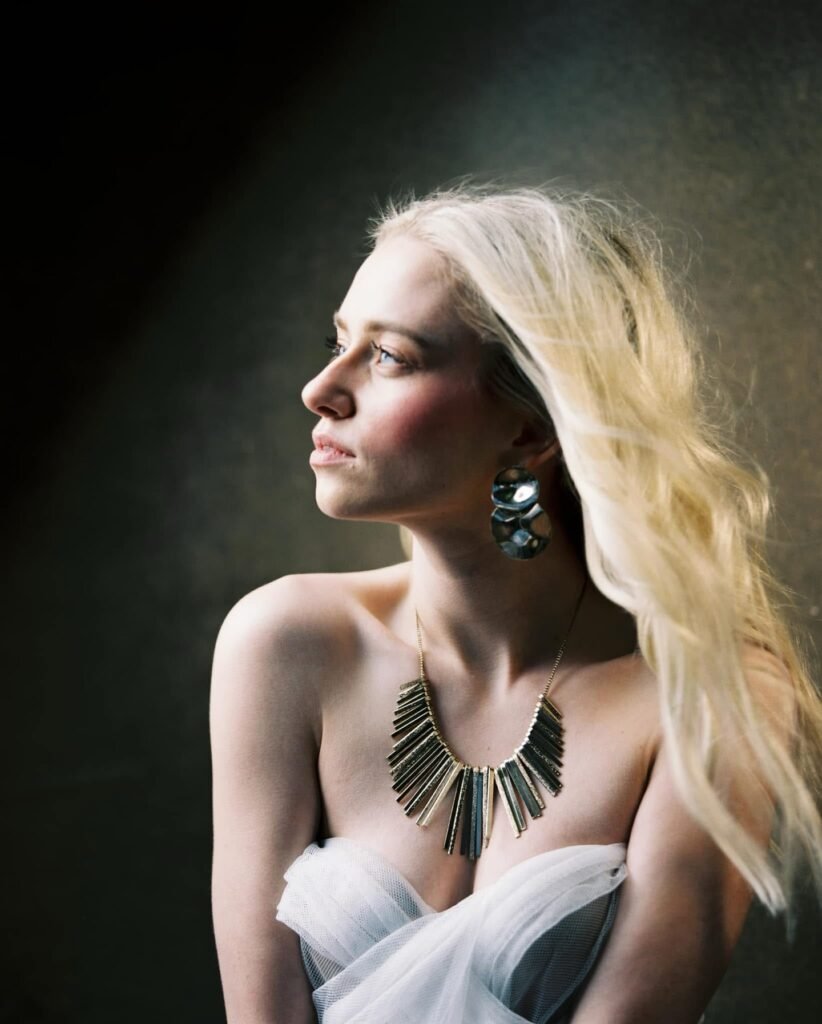 blonde woman in studio with studio light portrait shot with RB-67 camera on Kodak Portra 400 film.